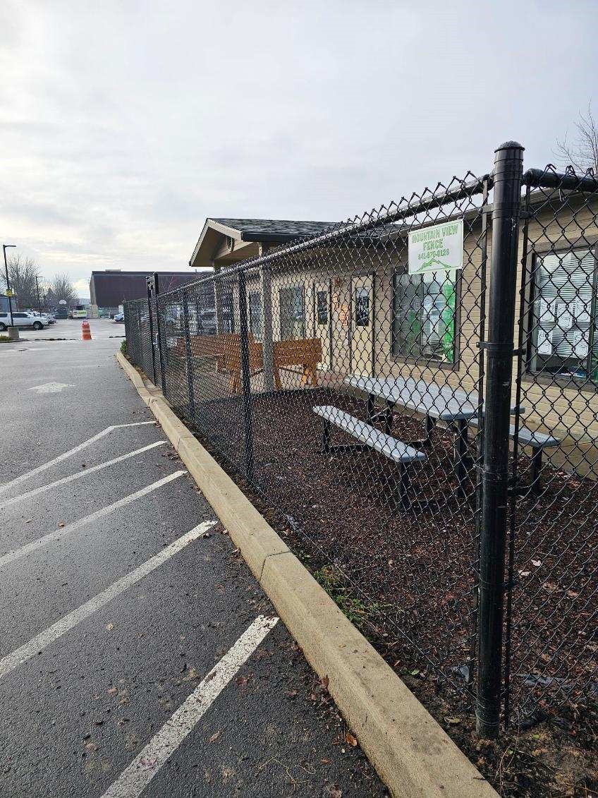 Black Chain Link commercial fence at a Jackson County business